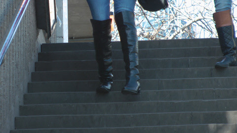 girl-in-leather-boots-candid