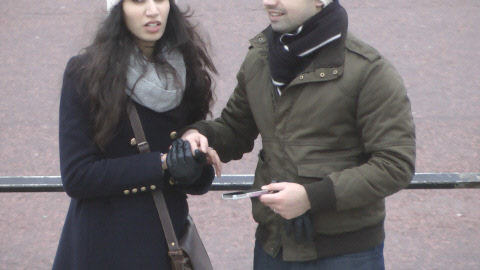 girl-holding-hands-leather-gloves