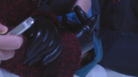 girl-in-shiny-leather-gloves-red-sweater